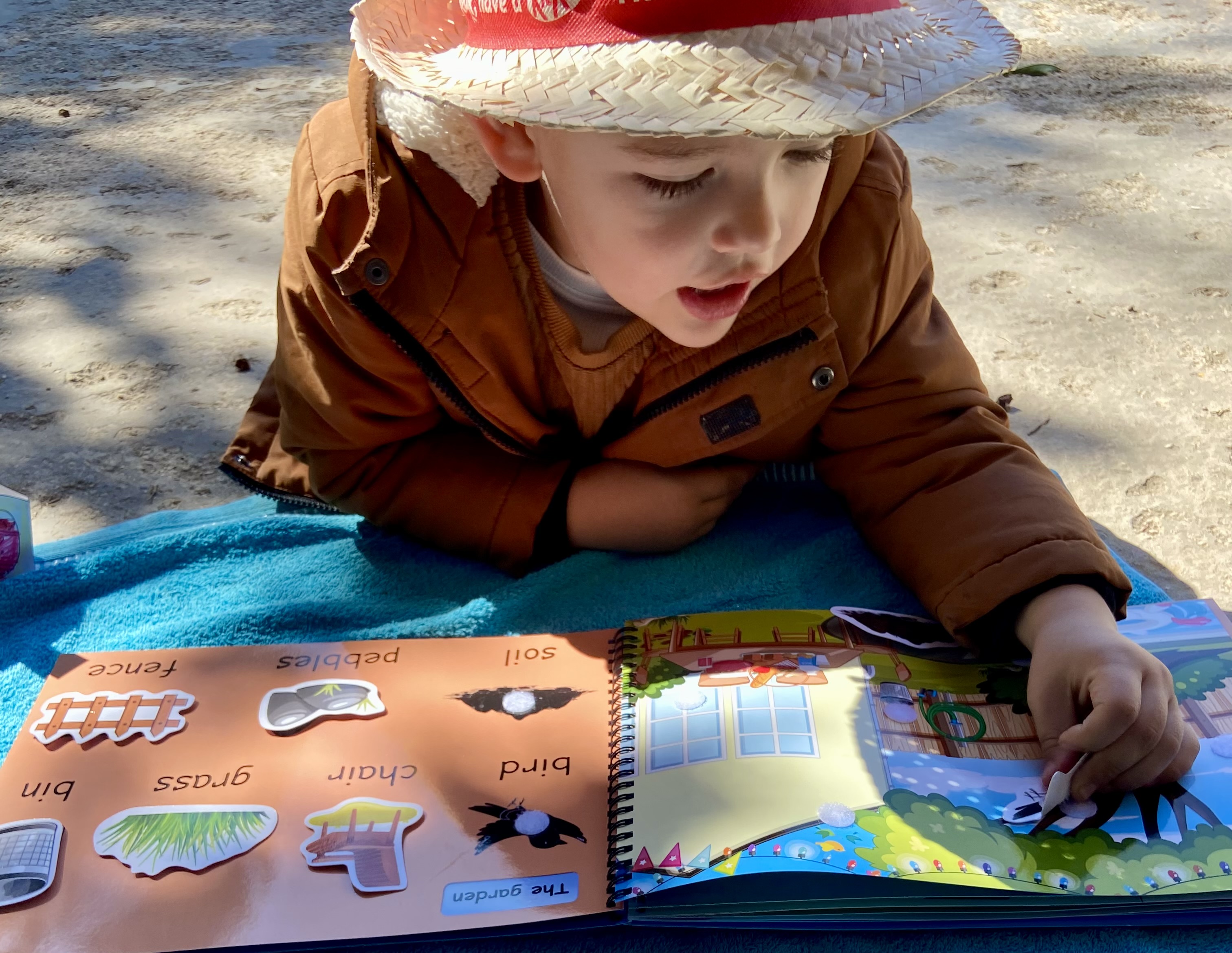 Child playing with an interactive book